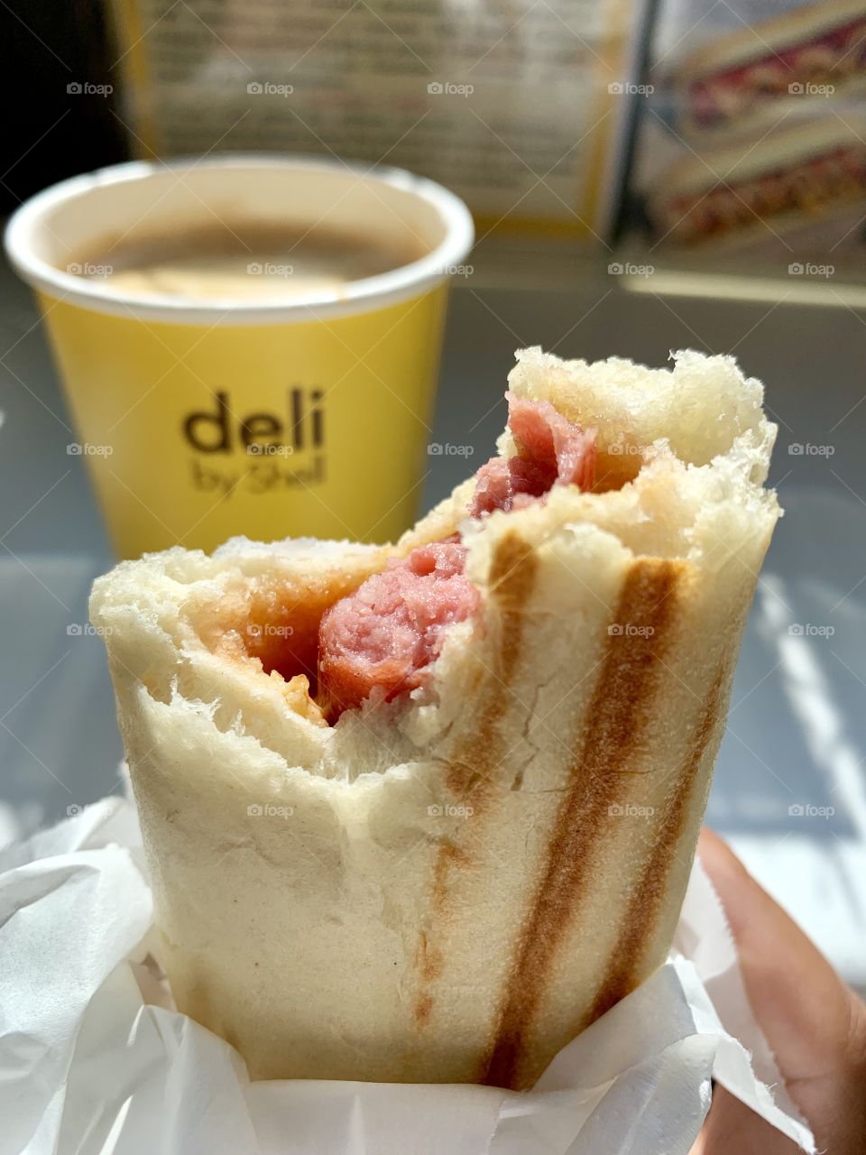 Let’s eat! Shell standout snacks. Deli by Shell. hot strong coffee and hotdog. 