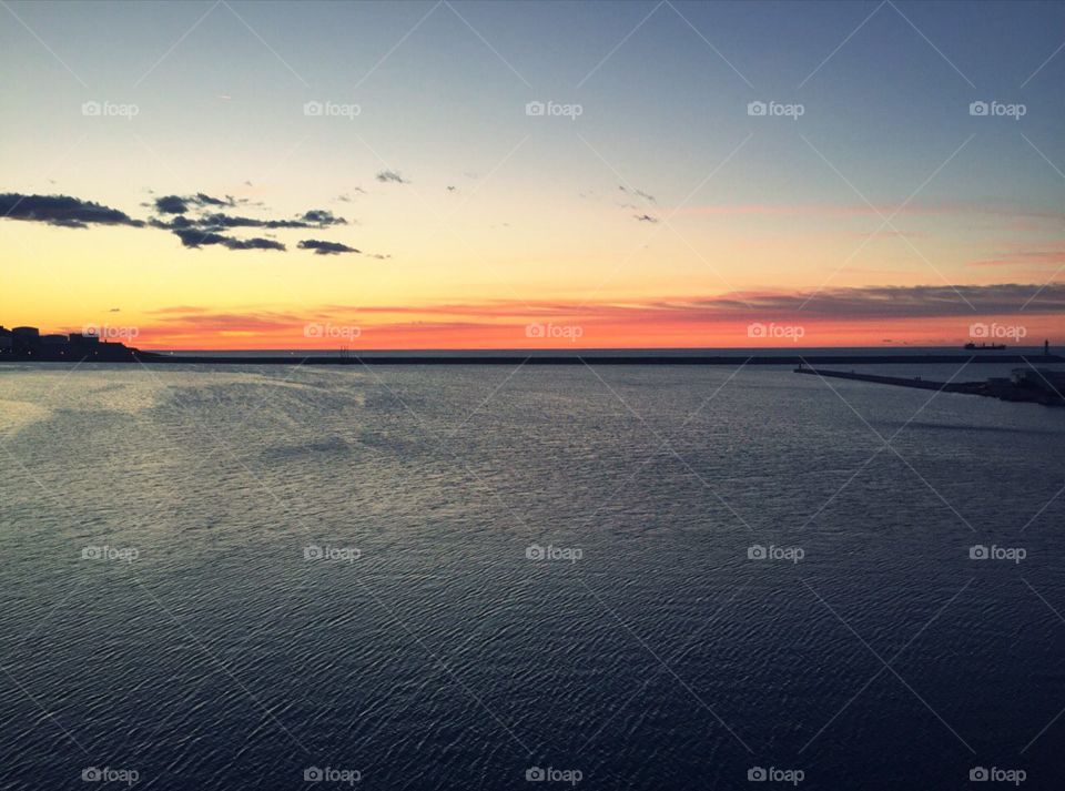 amazing sunset, sea and lighthouse