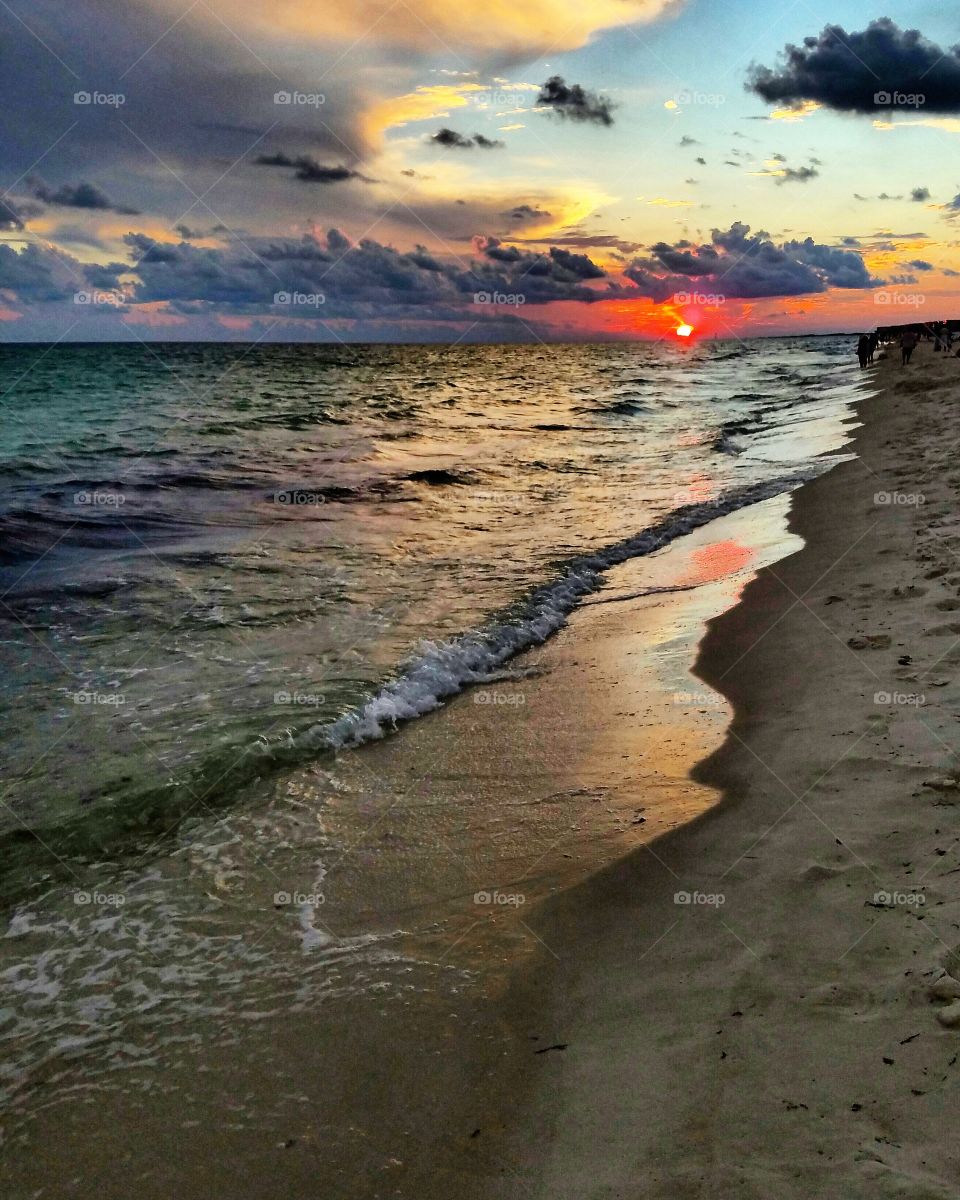 Sunset on the beach in Destin as a storm rolls in