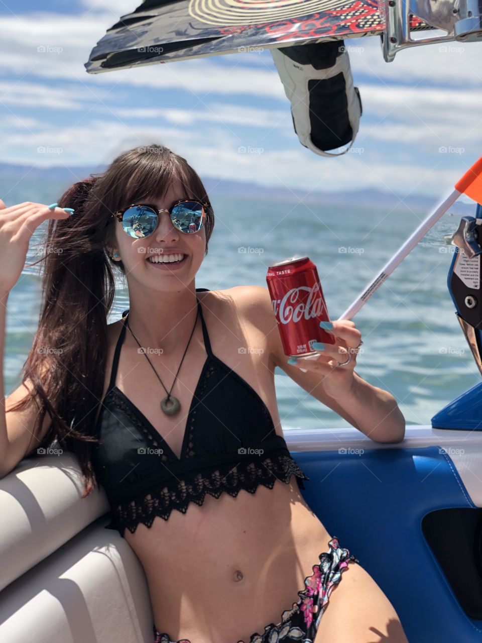 boating fun and drinking Coca-Cola 