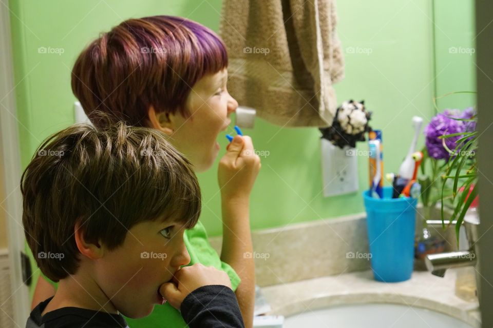 Boys Brushing Their Teeth