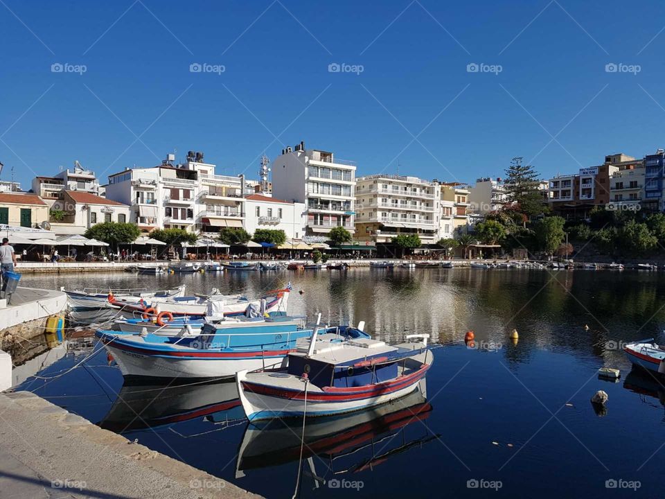 Fishing Boats in St Nicholas, Crete. Calm shore, Pretty Nature and relaxing Holiday Destination