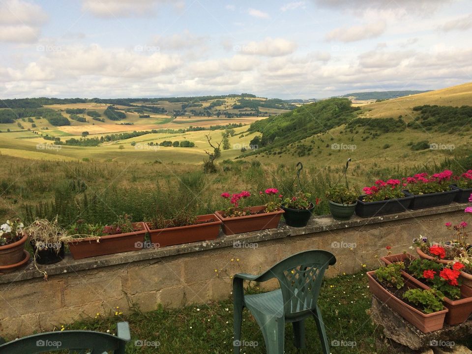 Enjoying the view with a glass of wine in Vitteaux France 
