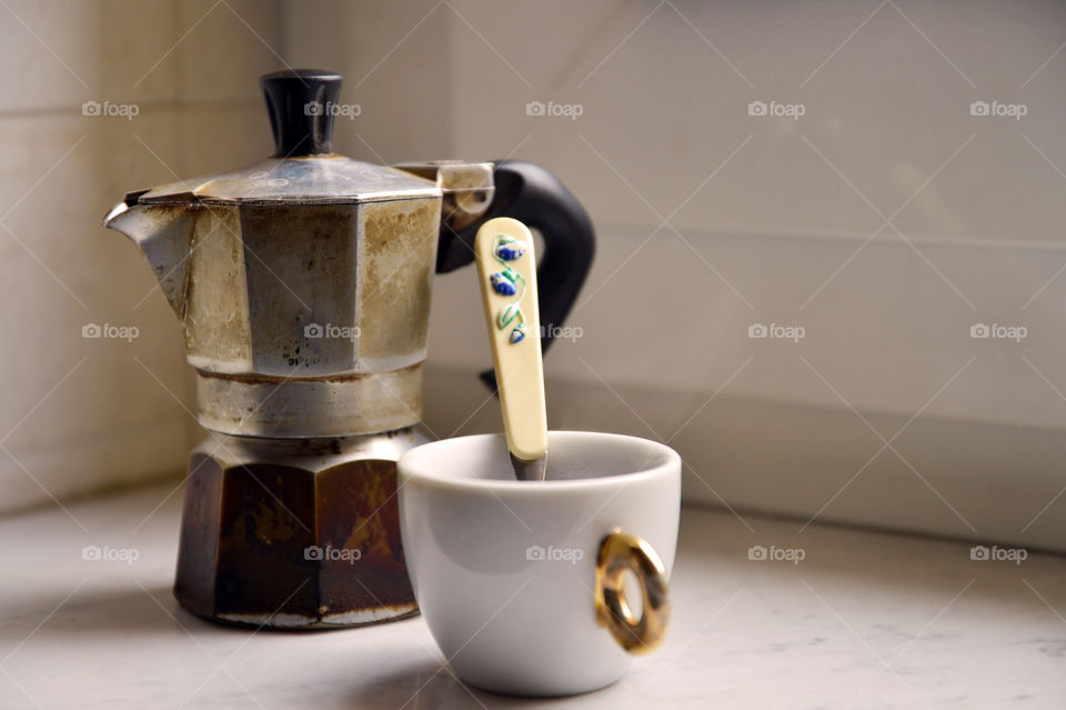 prepare an Italian coffee with old coffee house