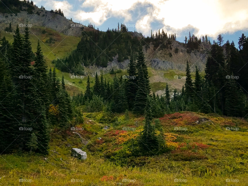 Peaks so high the sun hasn't climbed over