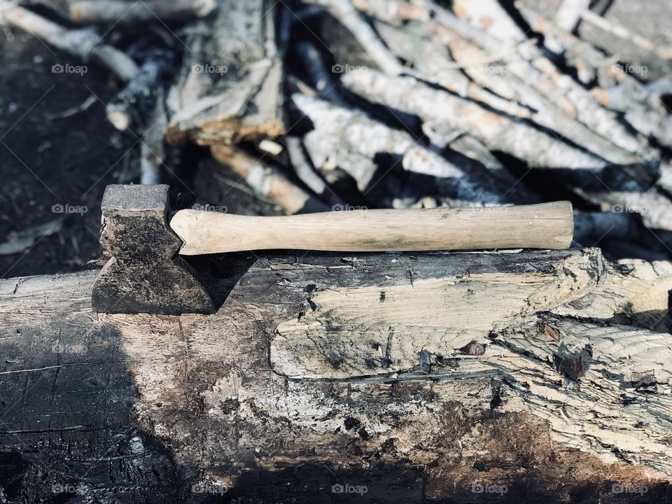 Axe on the wood 