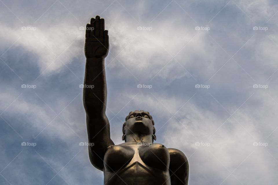 Retro statue against the sky