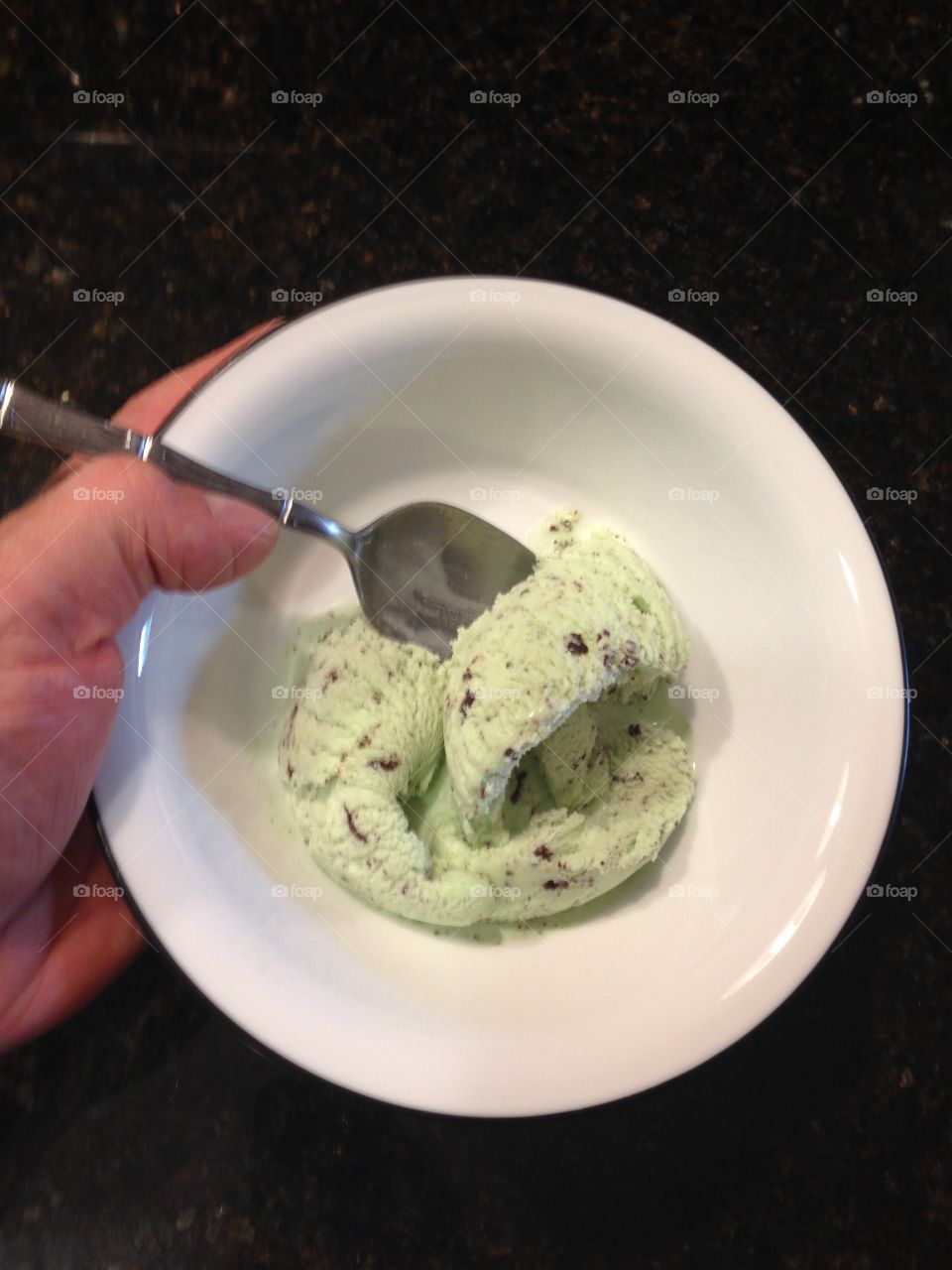  Ice cream in a bowl. Chocolate chip mint ice cream for dessert