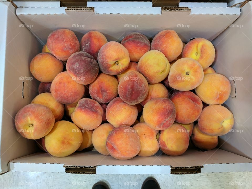 Box of peaches