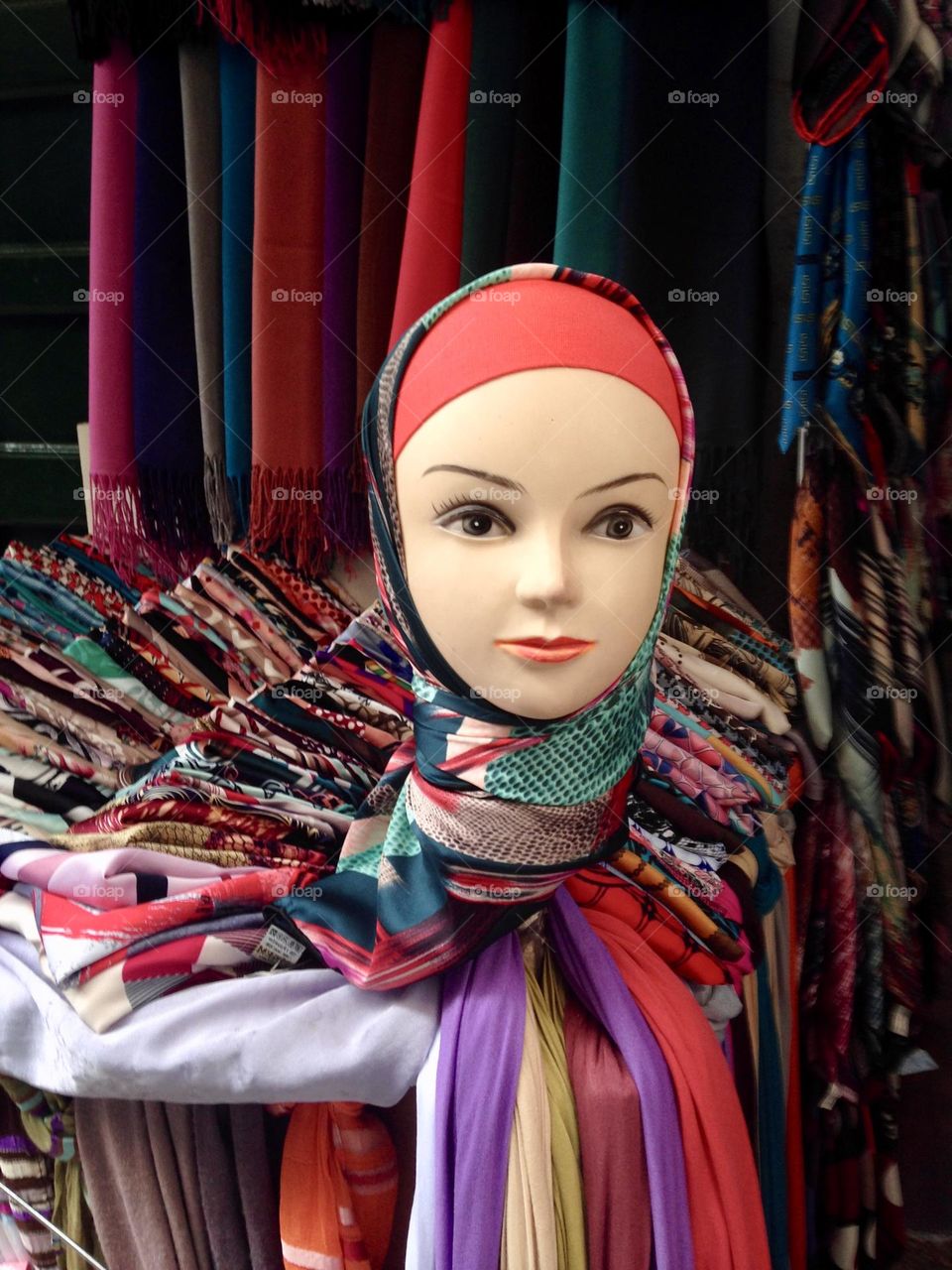 mannequin face with scarves in a market in Morocco