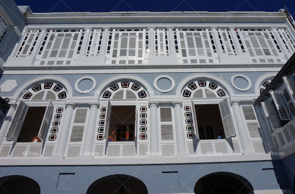 White window blinds . Photo taken in courtyard of government building in San Juan PR