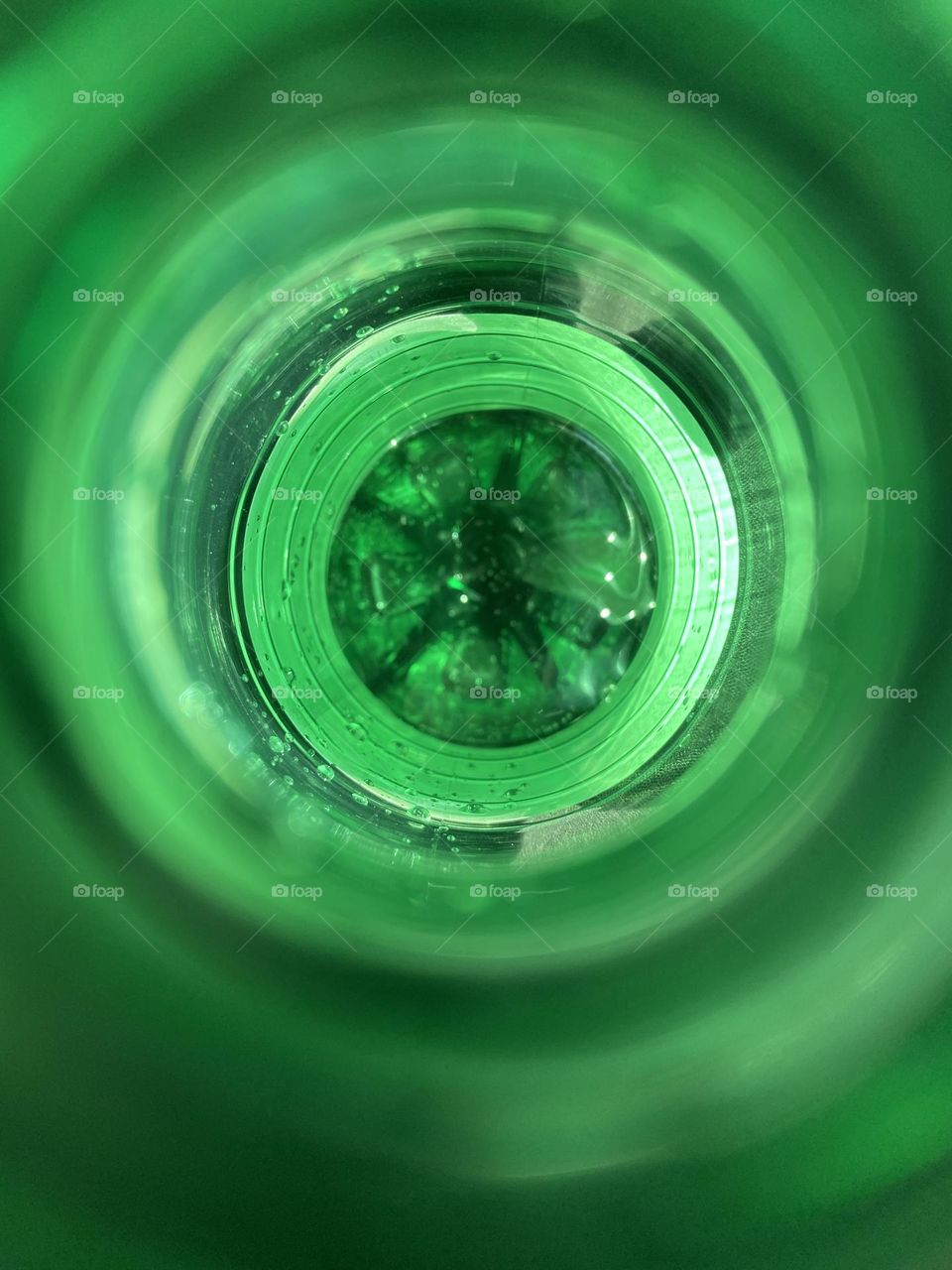 A green swirl of a San Pellegrino bottle around the sparkling water inside. I usually drink plain water, but, sometimes, I have a craving for the simple elegance of bubbles. 