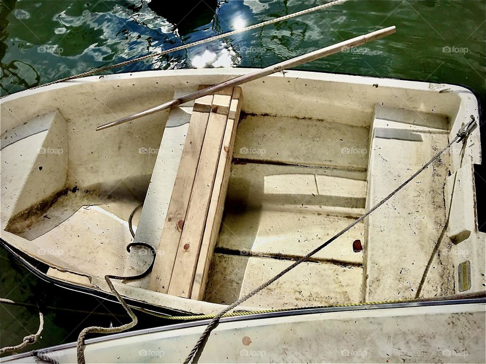 A dinghy is a small row boat that is used to get from the shore to a larger boat or ship anchored in the water further away from the land. 2021. Hypnotic Productions