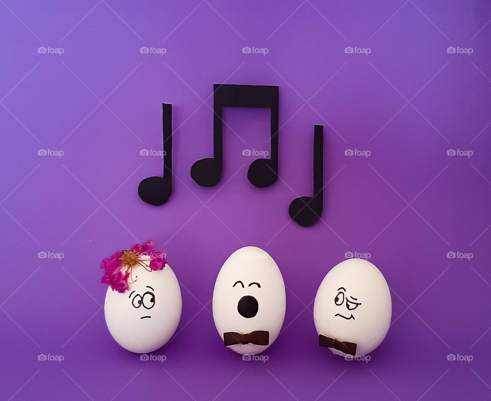 three eggs singing and one out of tune.