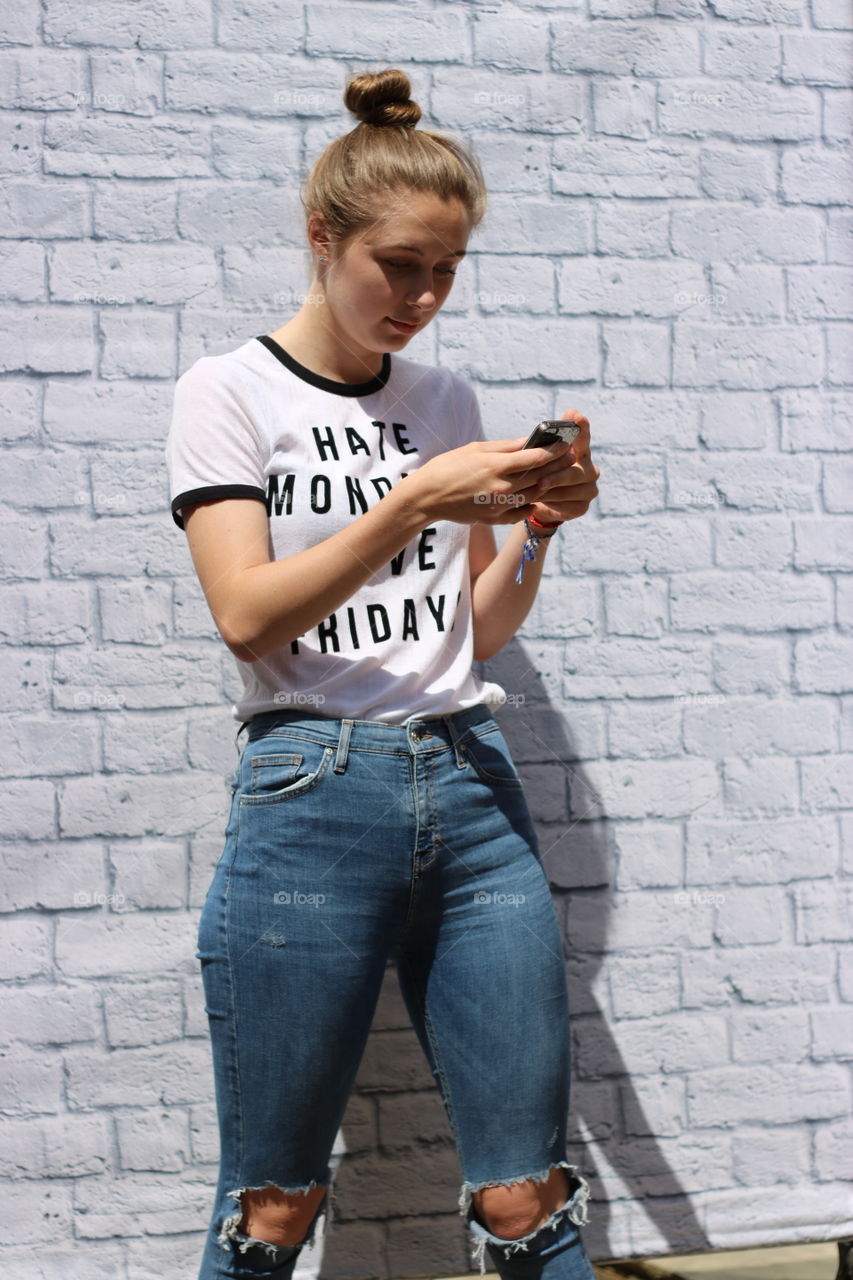 Young woman using mobile phone