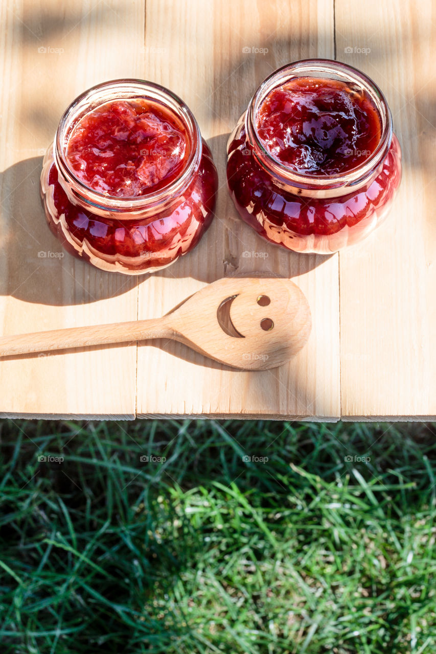 Homemade jam on wooden table. Homemade jam on wooden table