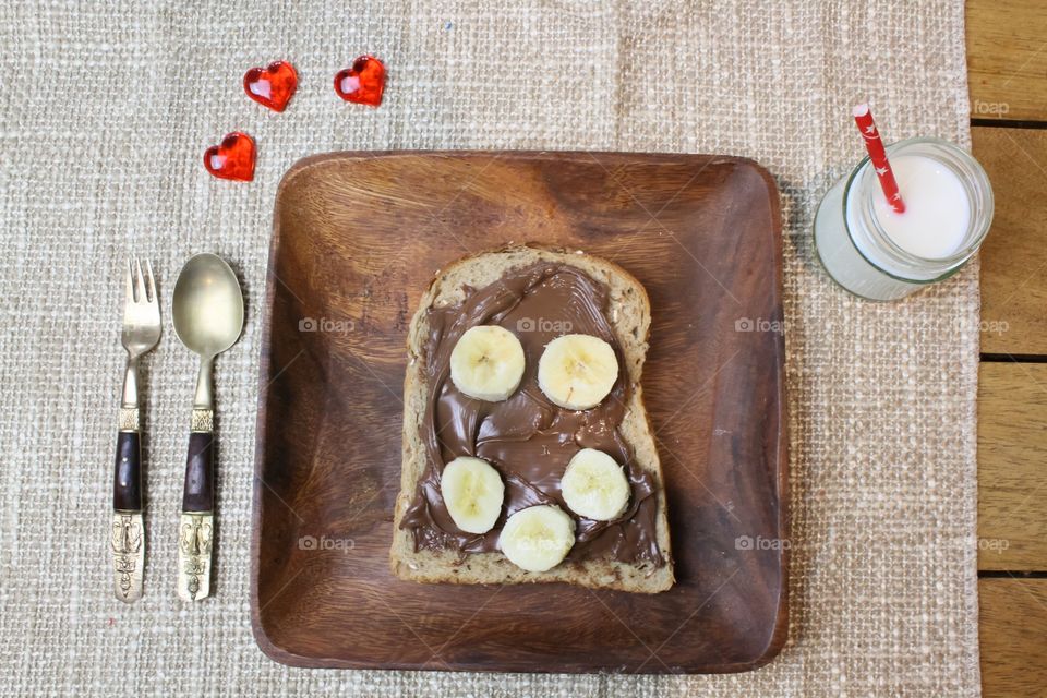 Bananas on chocolate spread on toast