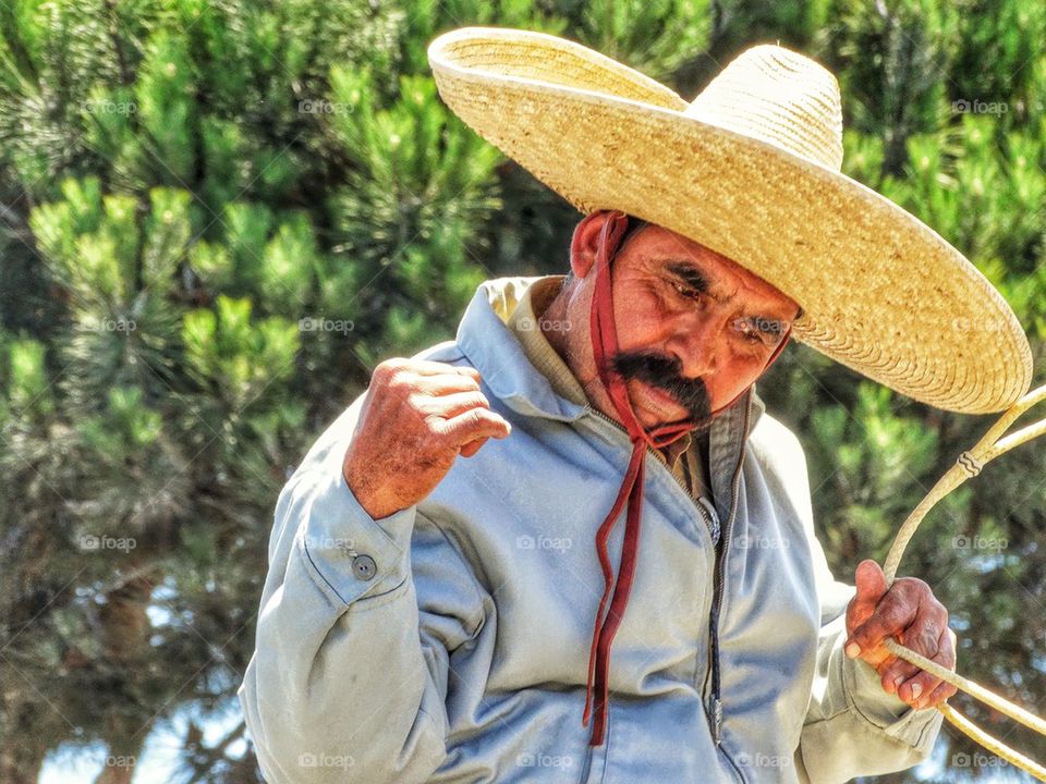 Mexican Pride. Man With Sombrero On Horseback
