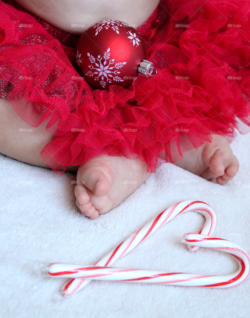 baby girl wearing red tutu