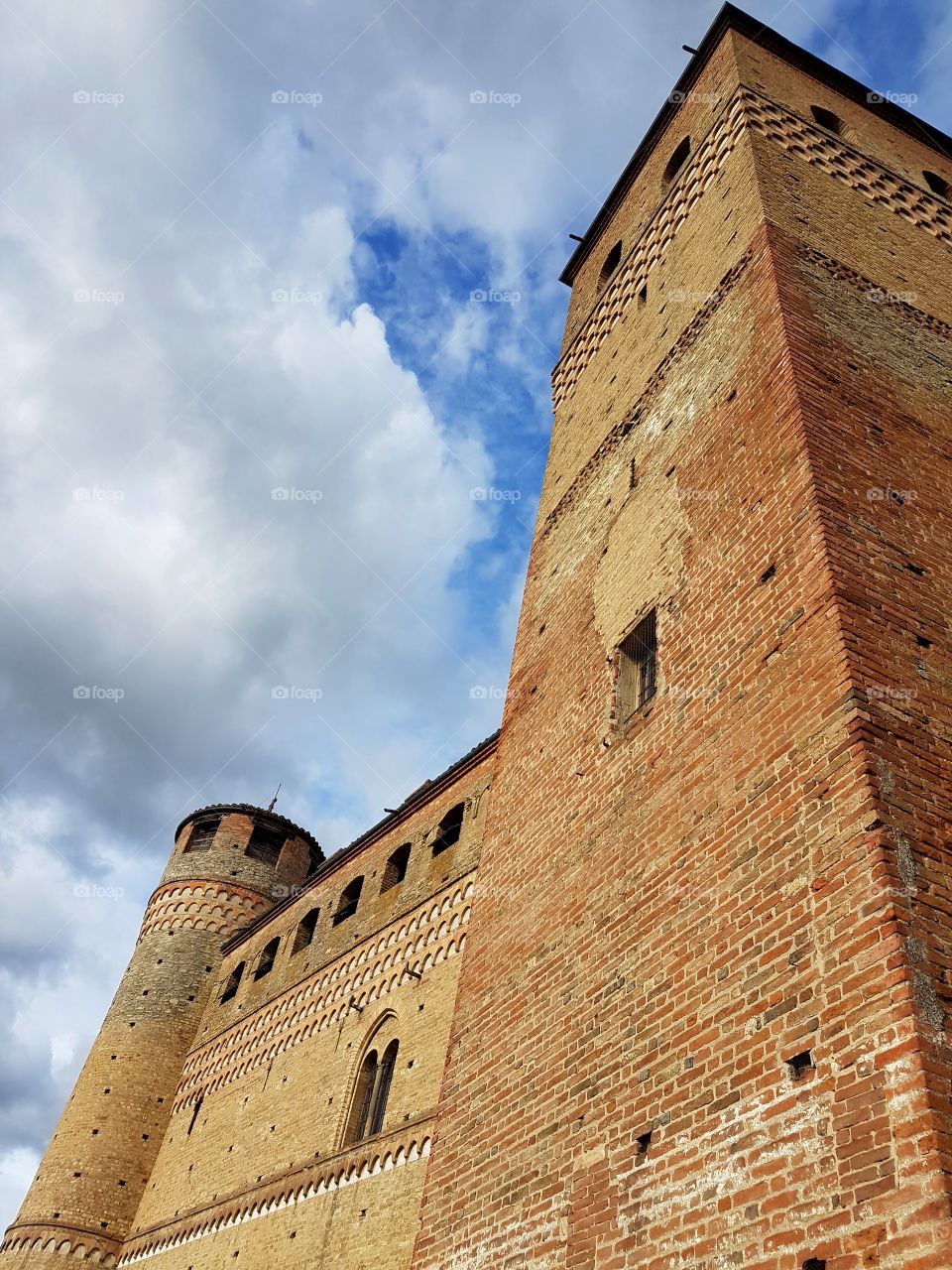 Medieval castle with towers in Piedmont, Italy