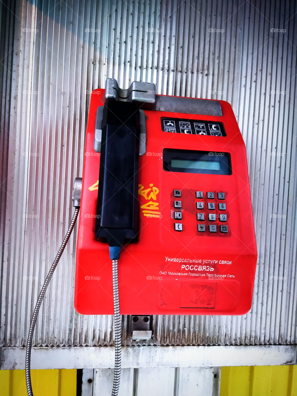 A booth with a red telephone on a Moscow street