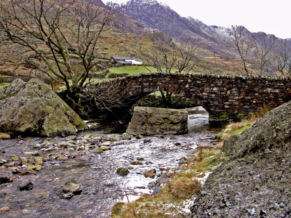 mountain stream old stone bridge snowdonia by PhilC