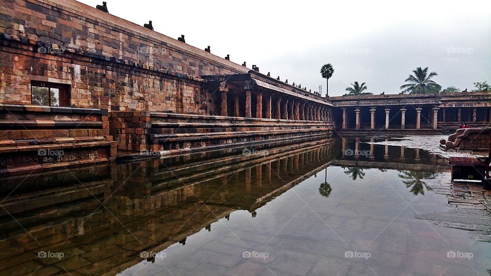 Tarasuram Raja Rajeshwaram temple wall reflection in rain water