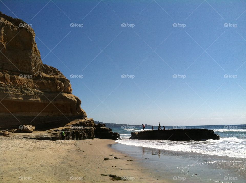 Surf, sand, and cliffs