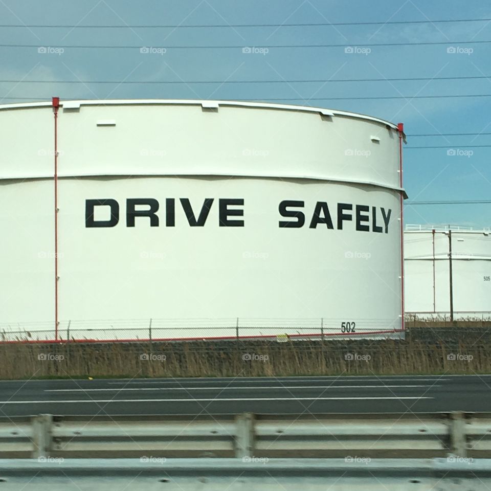 Things seen while on road trips, tanks with messages.