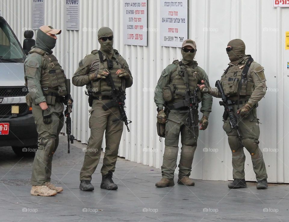 faceless armed special forces unit soldiers in jerusalem