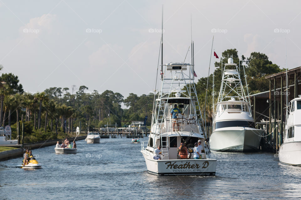 Family yacht going out for fishing competition in the sea