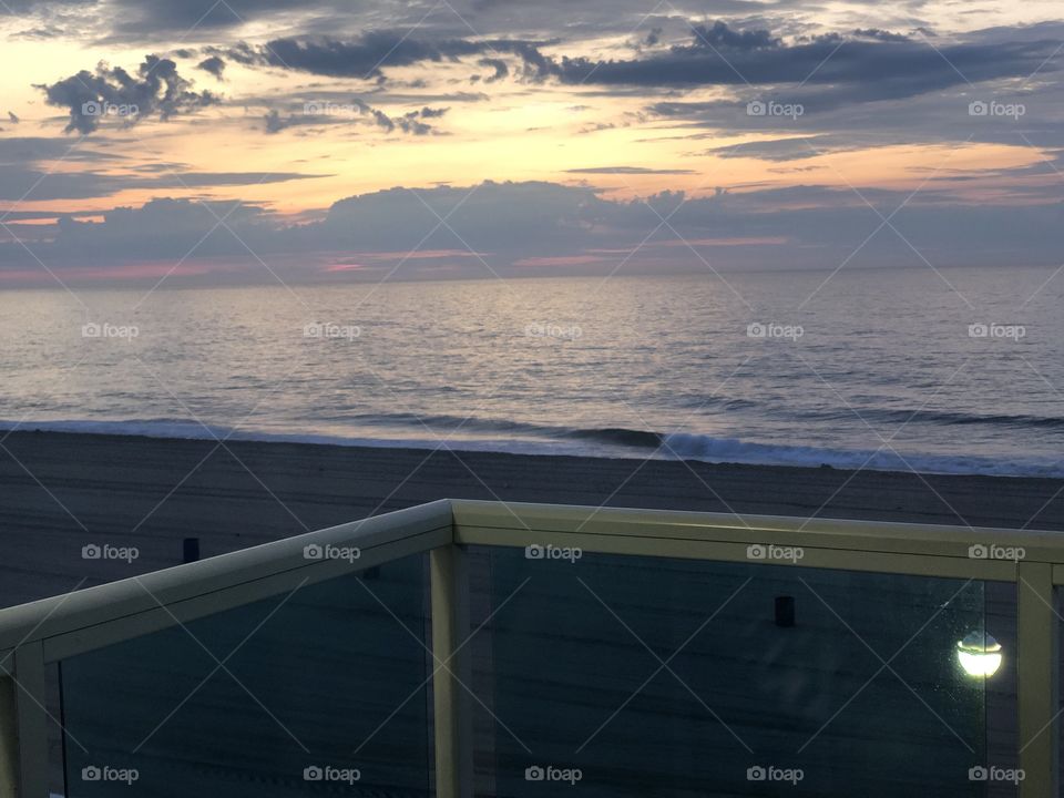 Sunset on beach off balcony