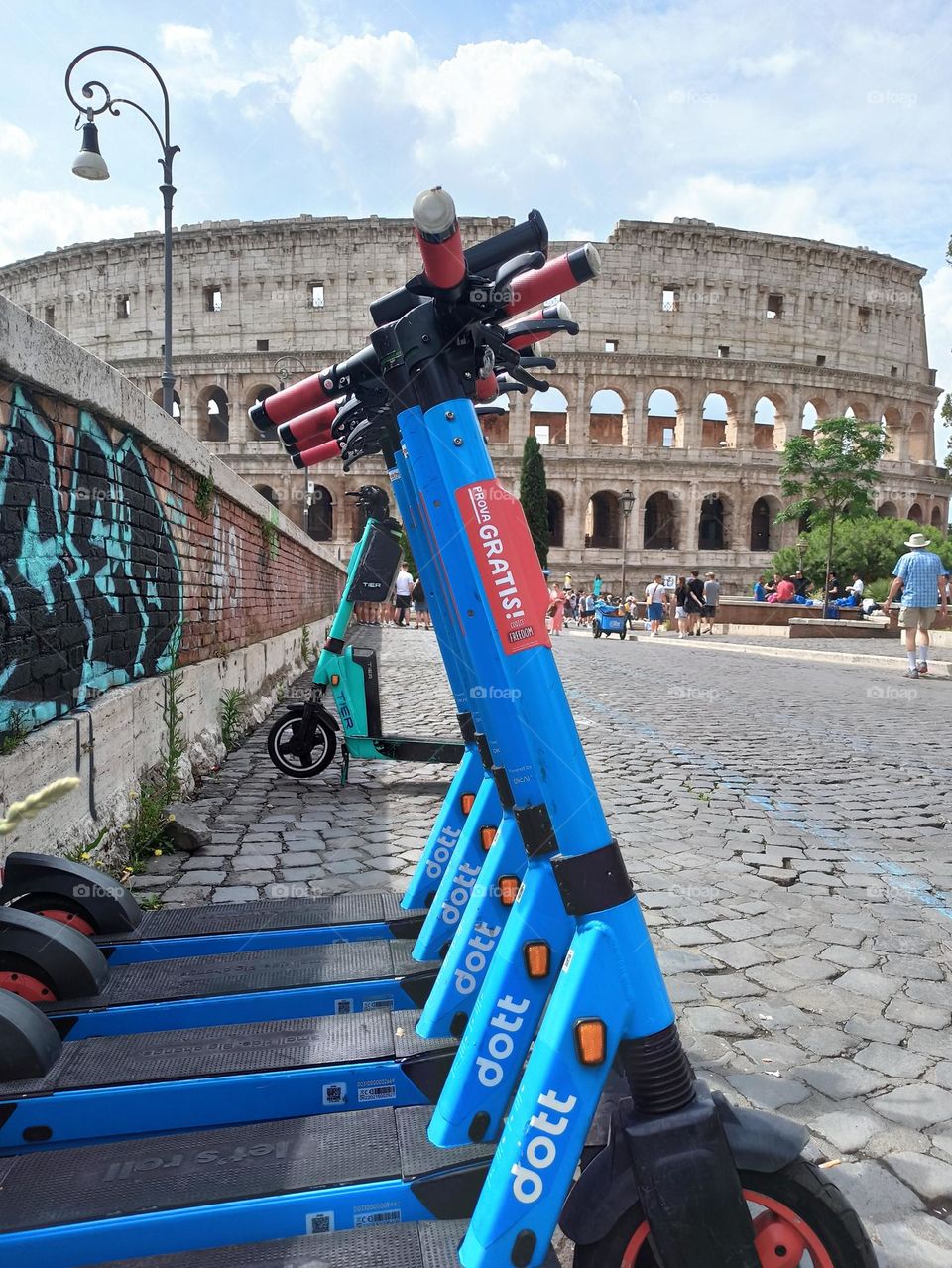 Vacation series : Summer in the city
Rome in summer, Colosseum. Scooters in front of the Colosseum.