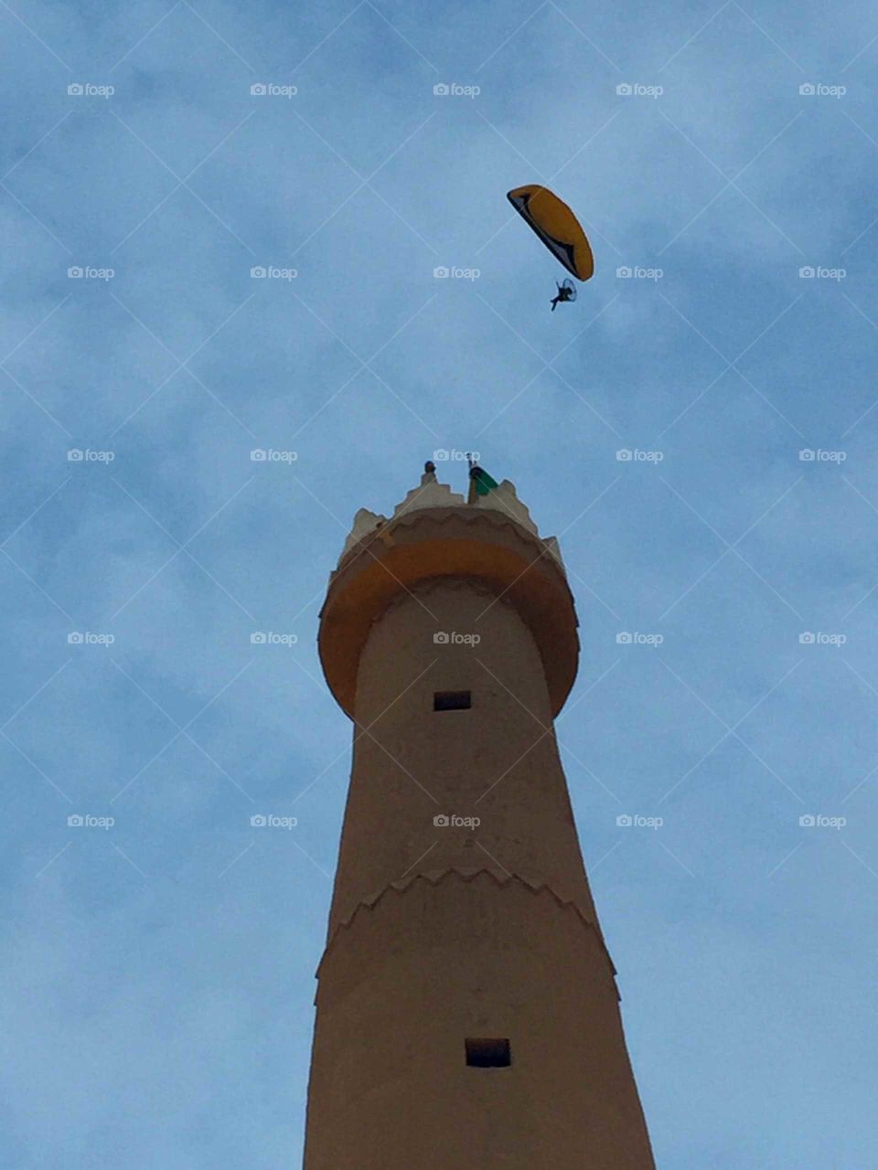 paraglider circuling tower Saudi Arabia