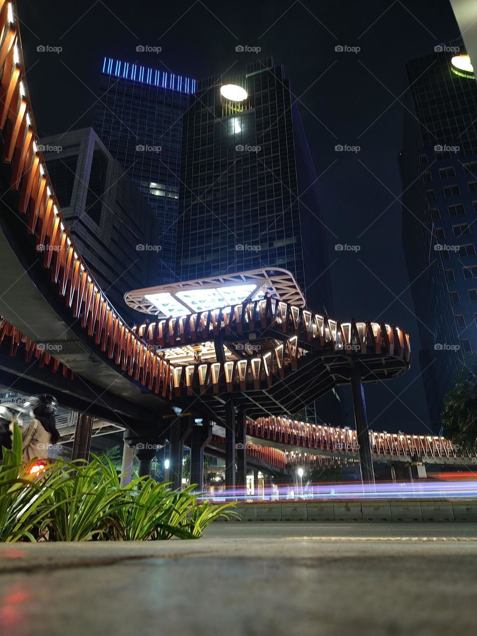 People's crossing bridge in the Sudirman area of ​​Jakarta City at night