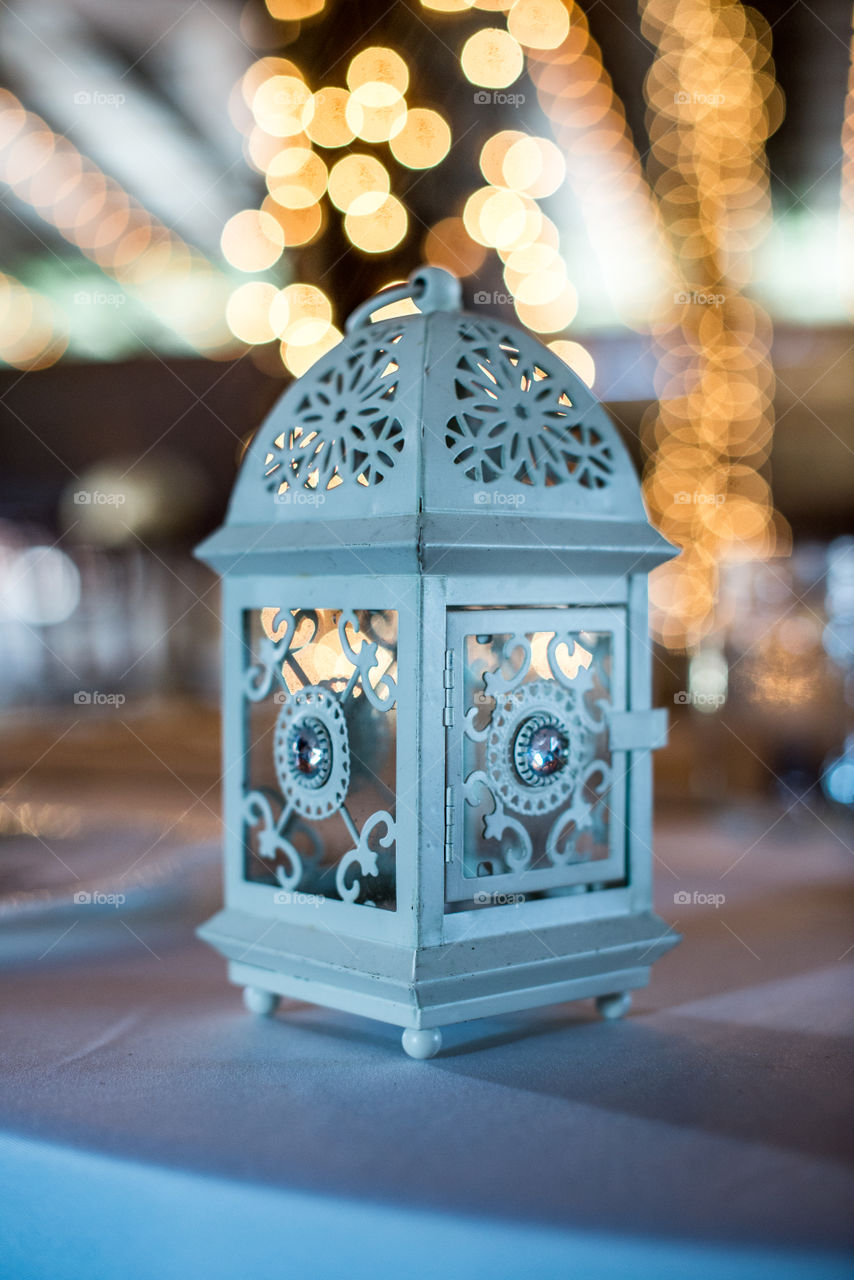Blue Ornate Lantern with bokeh background