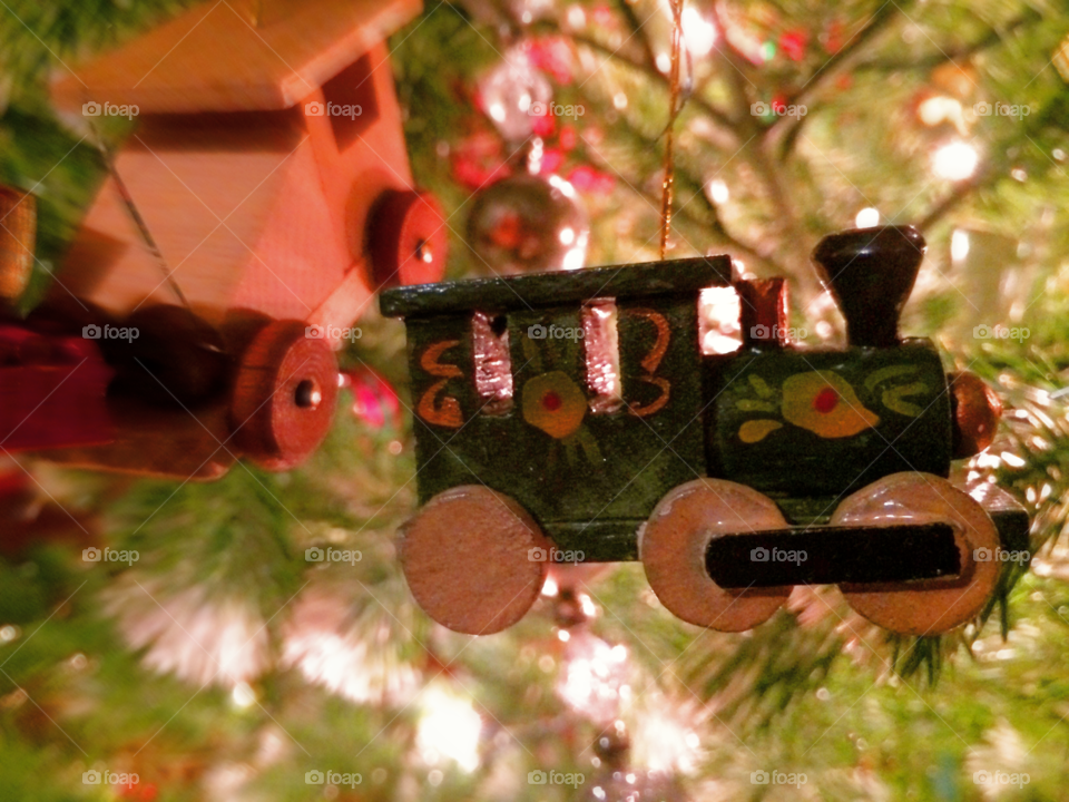 Christmas Choo Choo. Little train on a big tree.