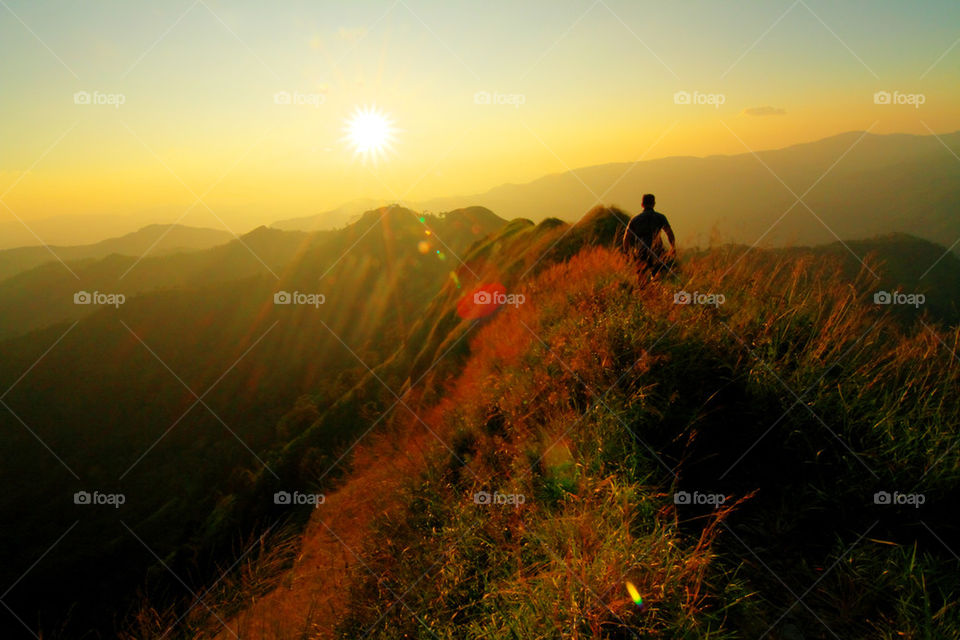 trekking in sunset