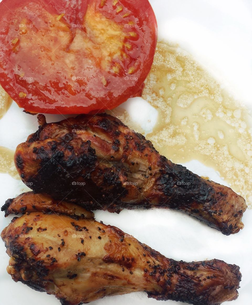 Food. Drumsticks and Tomato