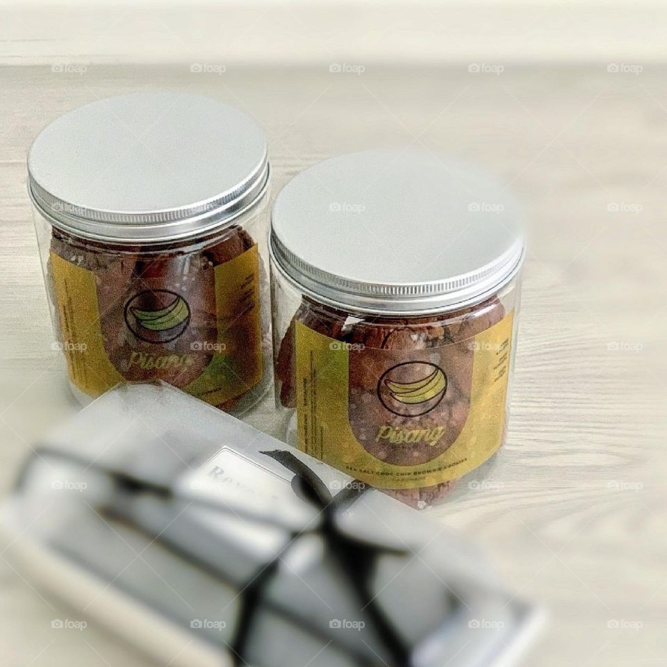 2 tubs of Sea salt chocolate chip brownie cookies looking delicious and yummy 