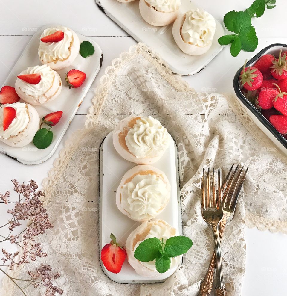 Meringue dessert with strawberries, top view