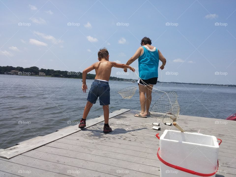 Crabbing net style. Teaching our little man how to catch a fresh dinner