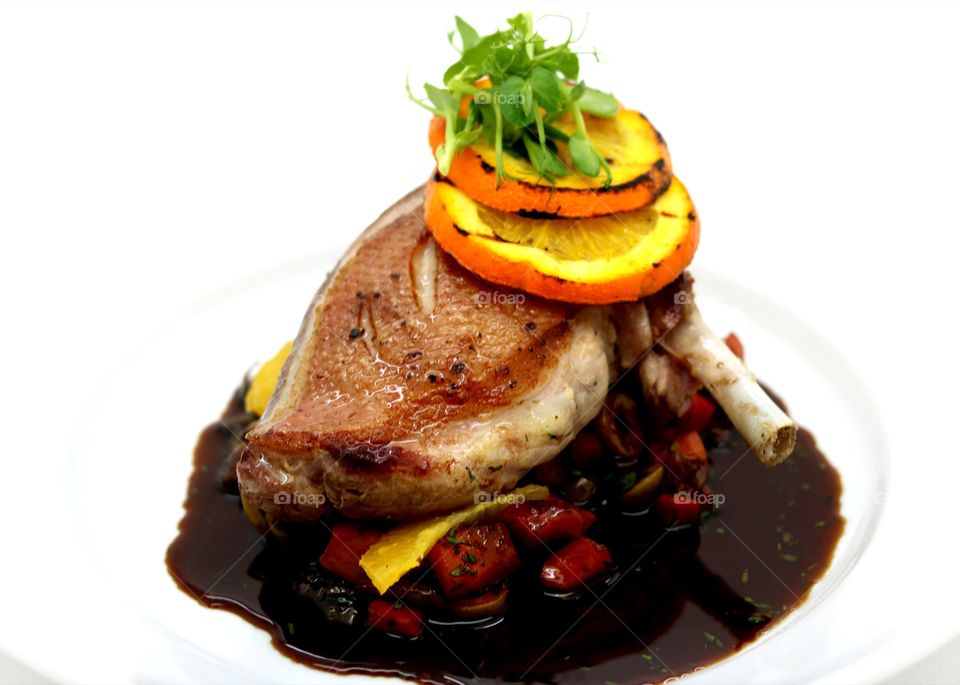 Food, carrigclenna free-range duck, crisp skin duck brest with sauce of orange, green olive, fresh herbs & spices