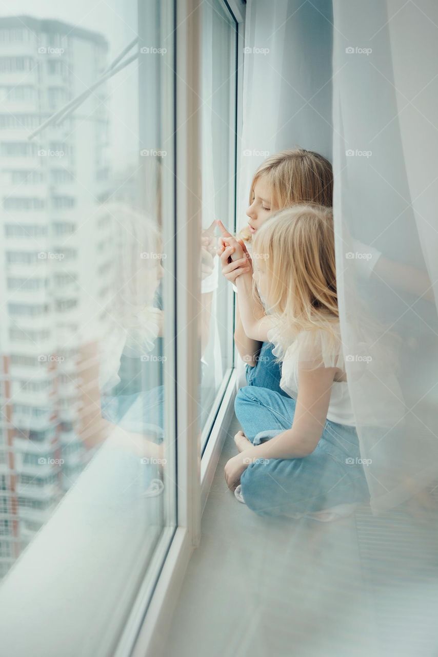 children near the window