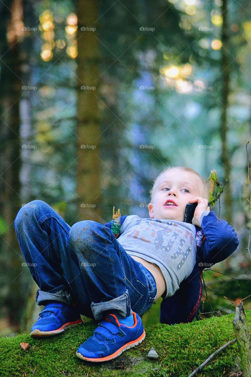 Boy talking in the cellphone