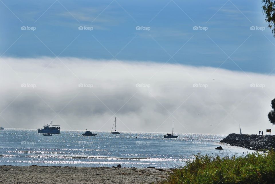 Fog rolling in on the ships