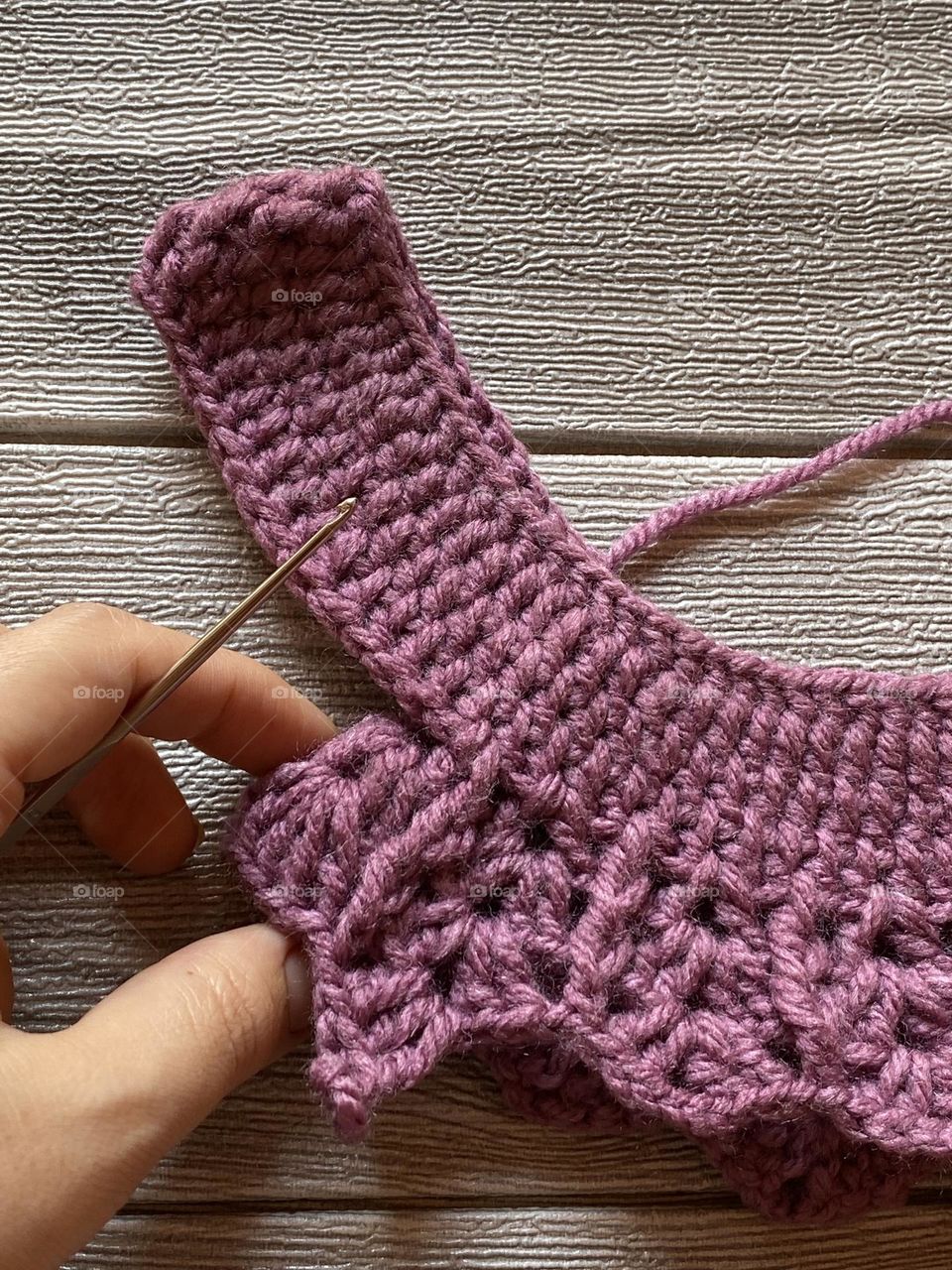 Making handmade woolen clothes 