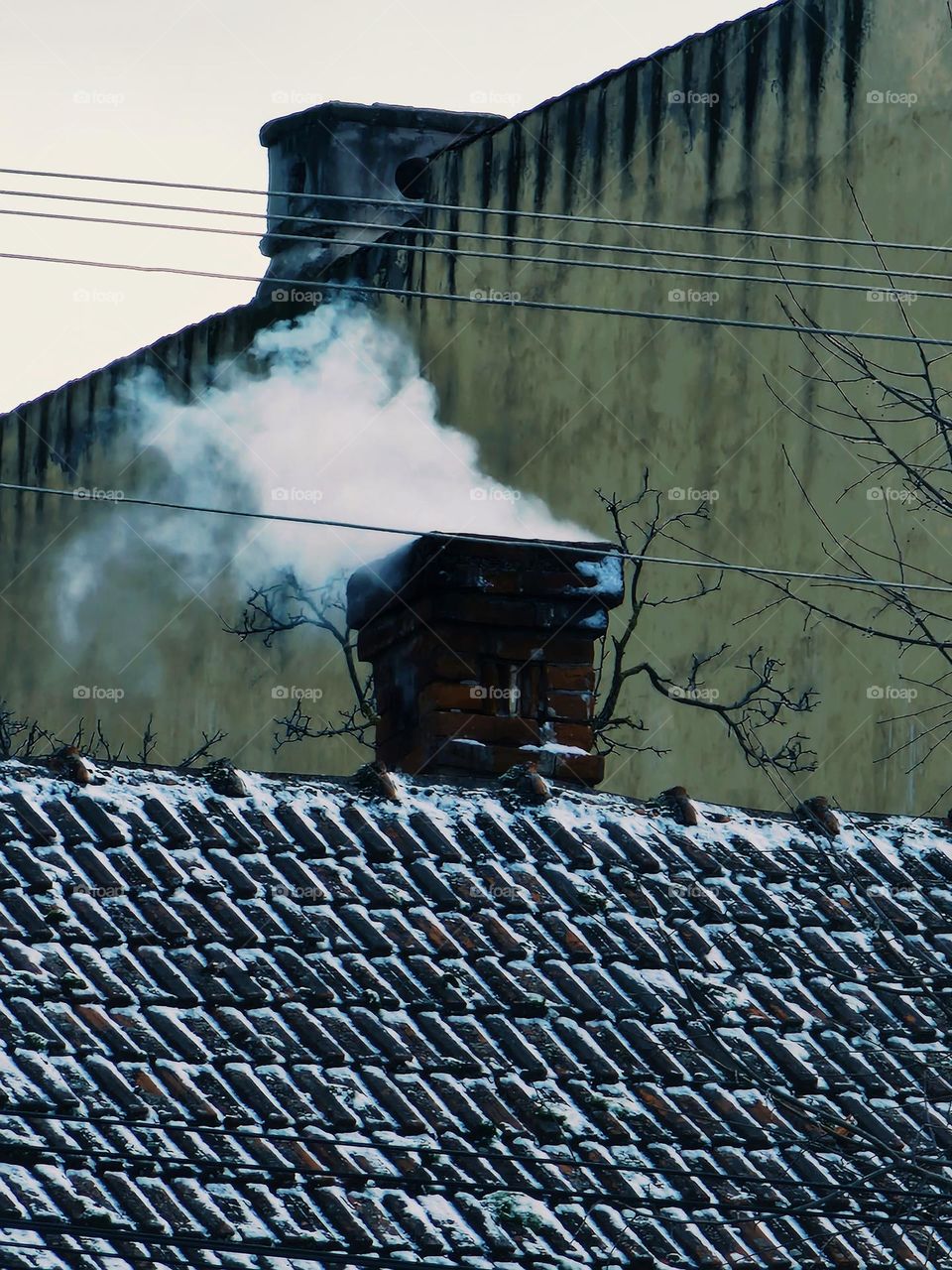 in winter the chimneys of the houses are white