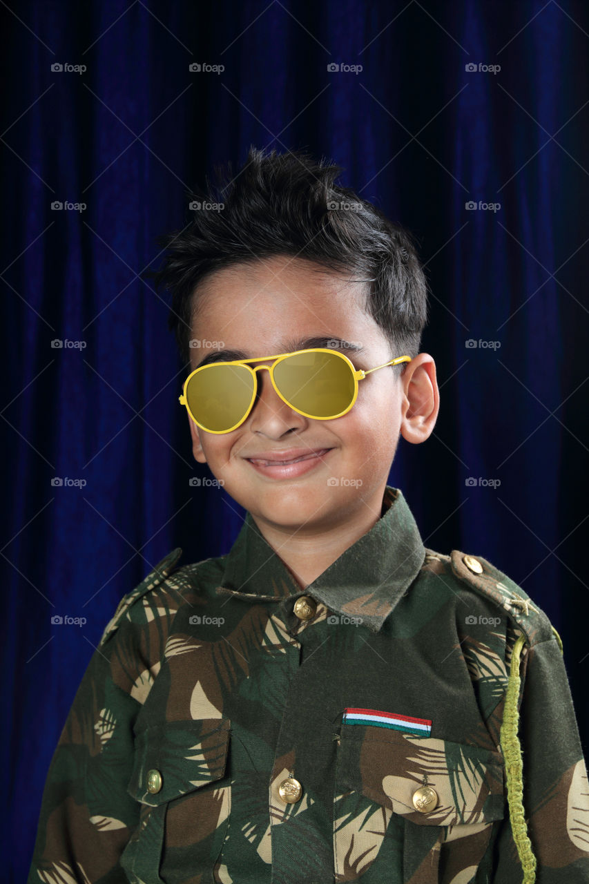 Indian boy dressed as a soldier / army / defence personnel