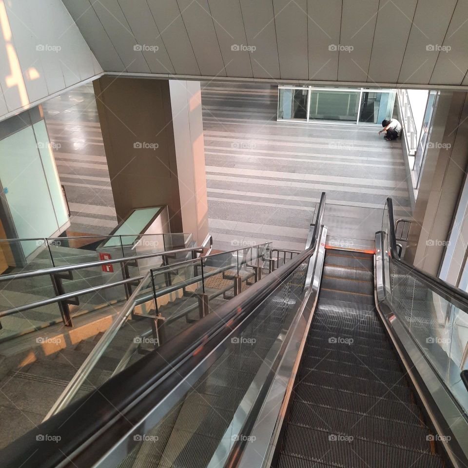 empty escalator down modern
